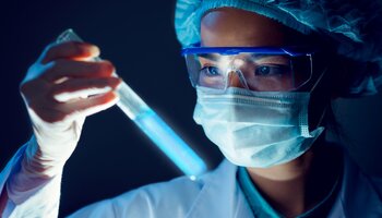 image of researcher holding test tube