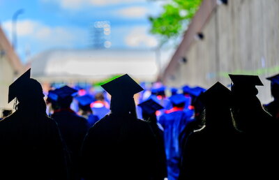 graduates in cap and gown